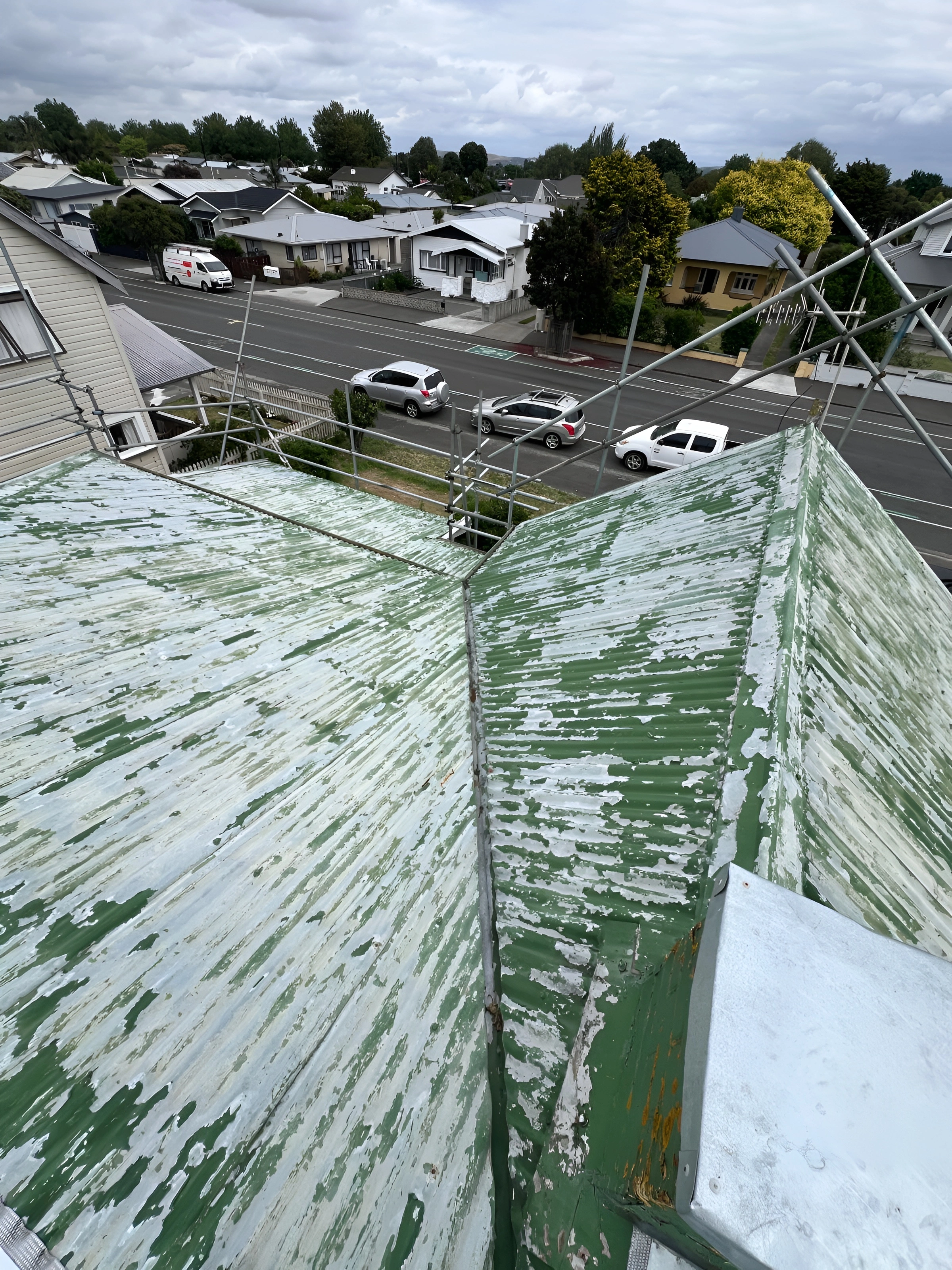 Roof painting before Napier peeling corrugated iron