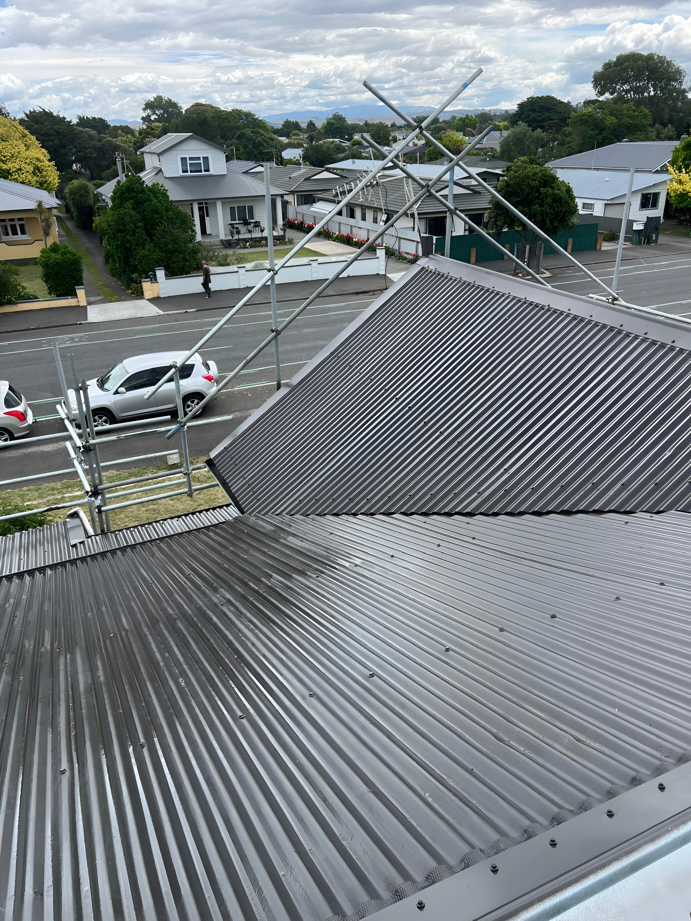 Roof painting Napier before and after corrugated iron